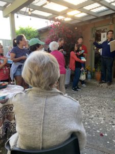 Paul Fadelli (right) calling participants together for presentations