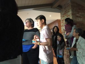 Cecelia Knowles and others, listening from inside the Fadelli home.